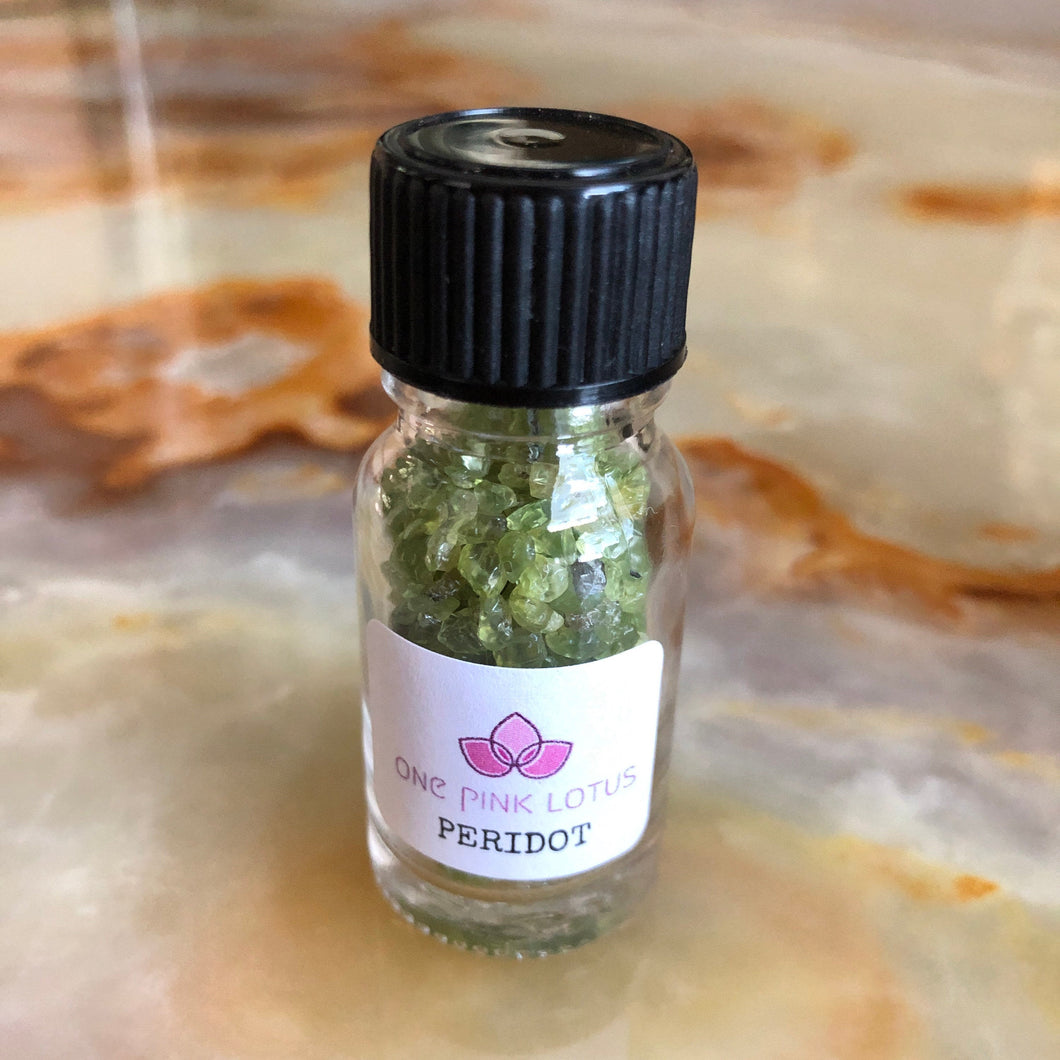 PERIDOT chips (small gift) in a bottle for spells, meditation or crafts