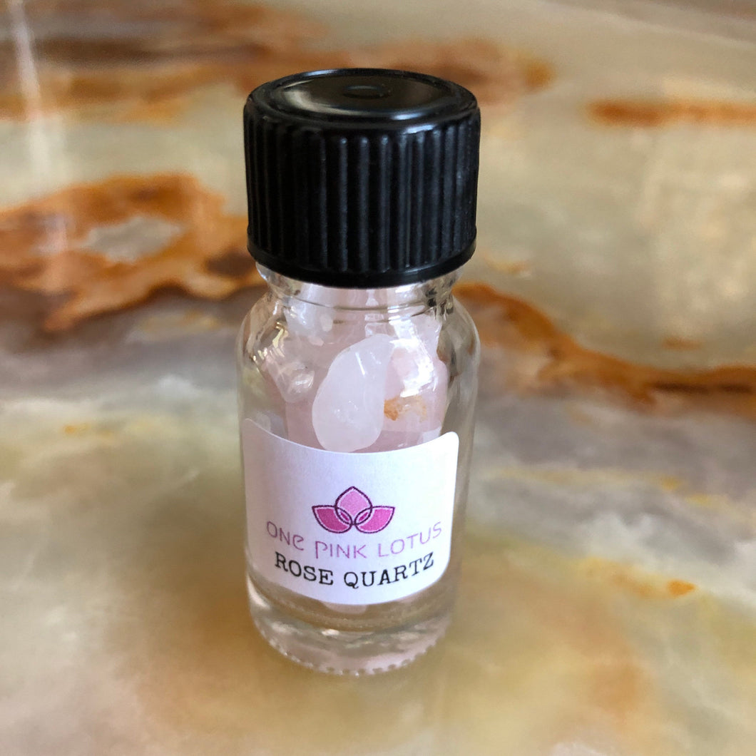 ROSE QUARTZ chips (small gift) in a bottle for spells, meditation or crafts