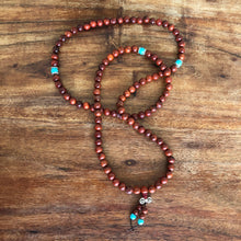 Load image into Gallery viewer, Mala Beads Necklace - Cat Eye Sandalwood 8mm 108 beads.  Worn as bracelet or necklace
